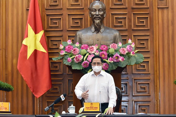Thủ tướng Chính phủ Phạm Minh Chính phát biểu kết luận cuộc họp của Thường trực Chính phủ về phòng chống COVID-19, chiều 24-5 - Ảnh: VGP